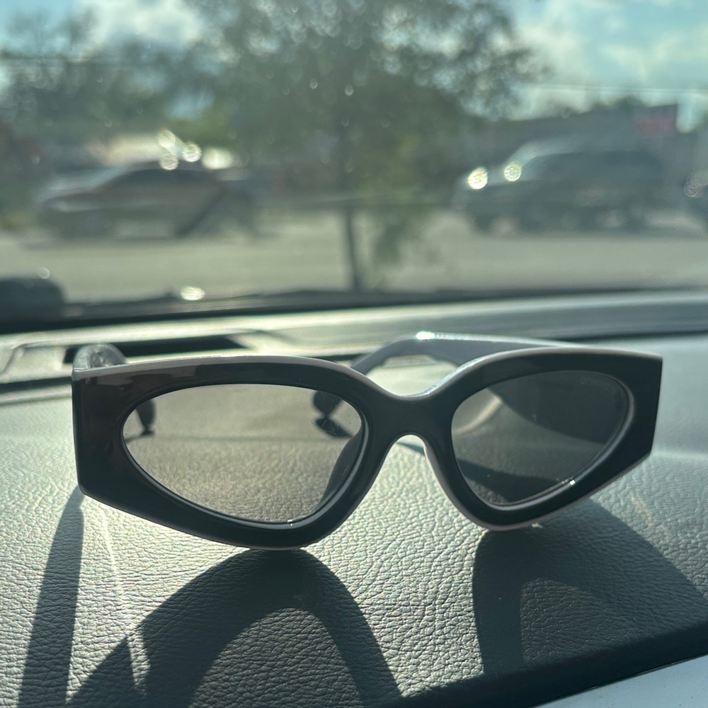 CHANEL Black Cat-Eye Sunglasses with Dark Lenses